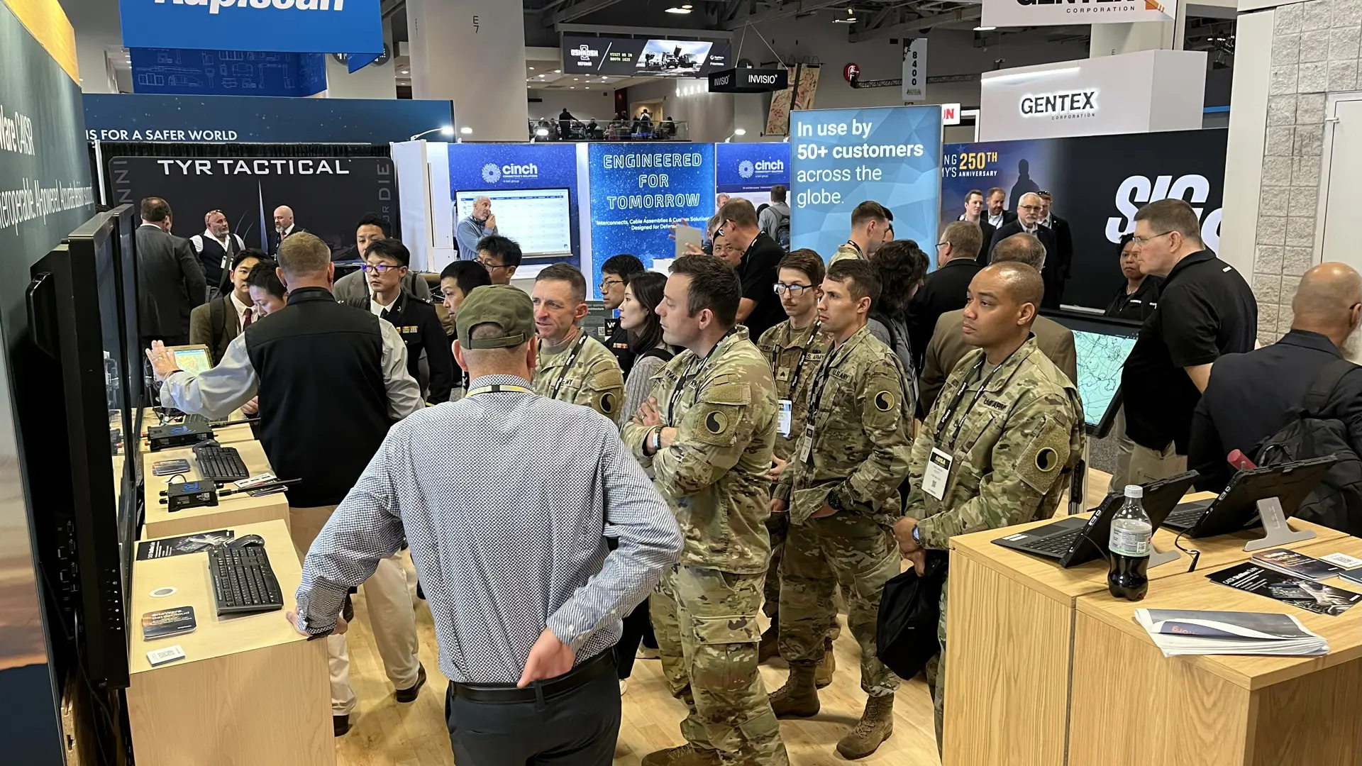 Systematic staff demonstrate SitaWare software to attendees during the AUSA 2025 trade show in Washington DC