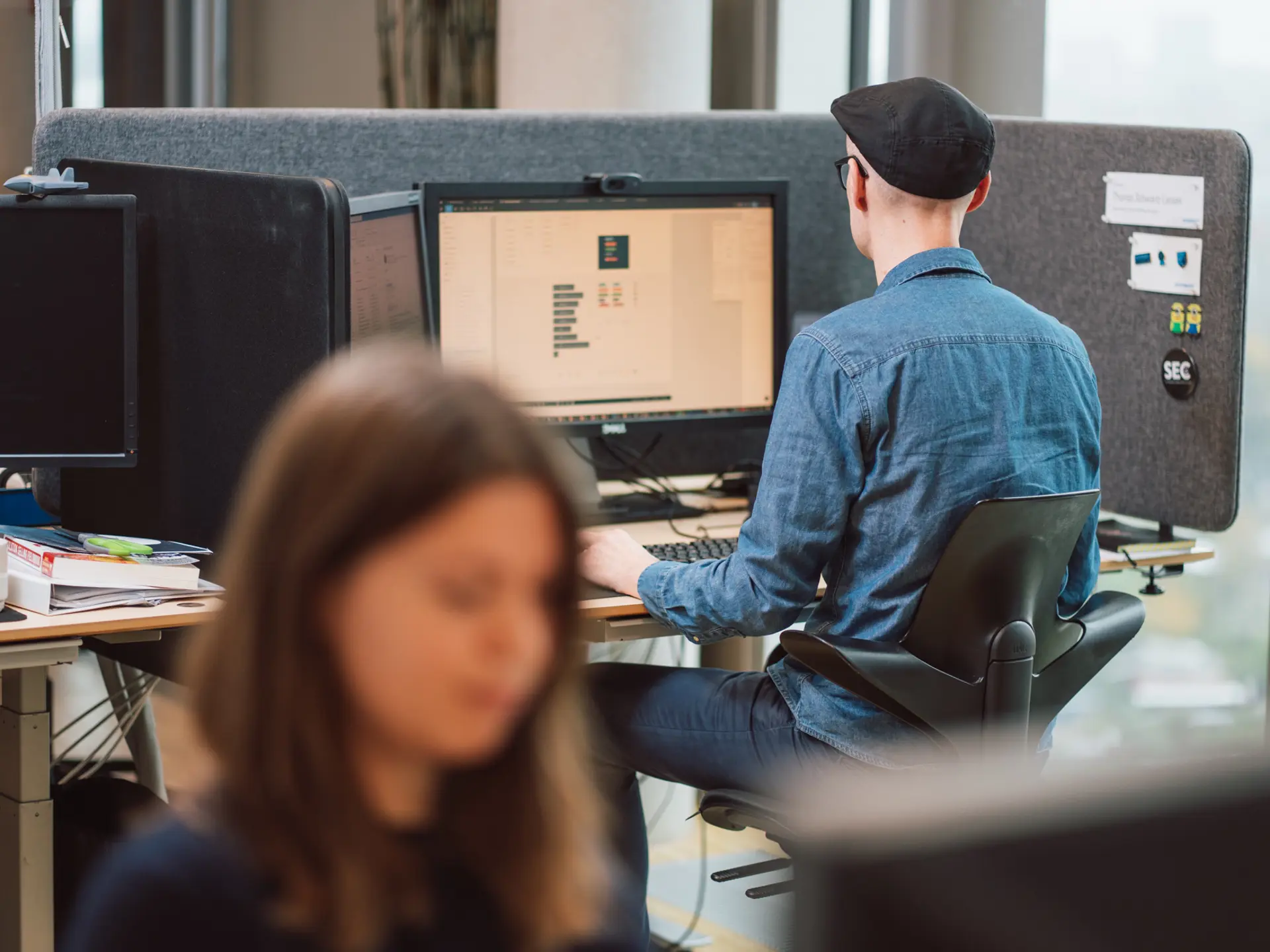 Systematic A/S employees working on office